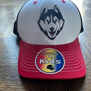 A boy’s hat with wolf logo. Adjustable on back. Never been worn.